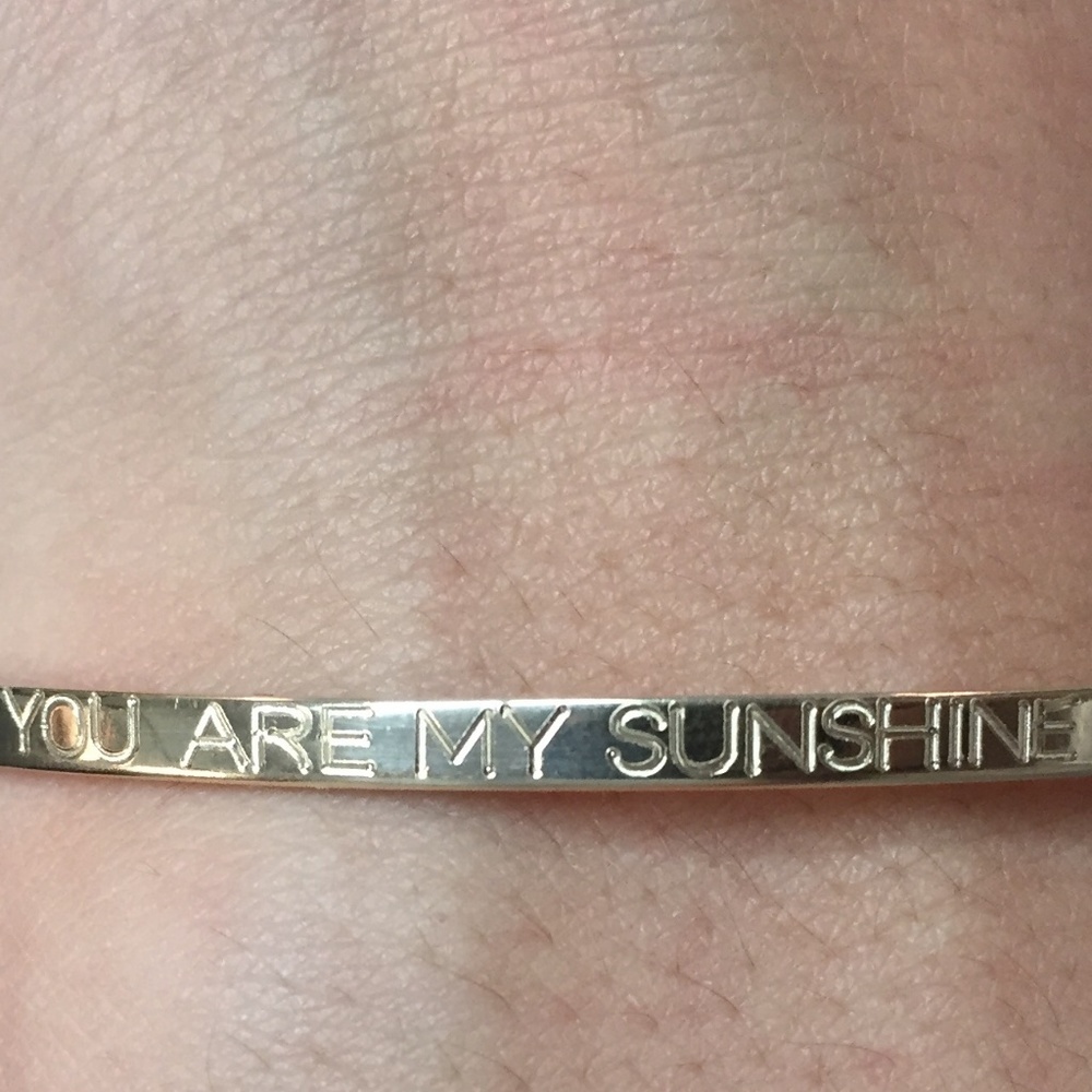 Gold Bracelet saying "You Are My Sunshine"
